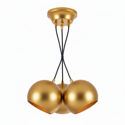 Gold pendant light fixture with three spherical shades on a white background